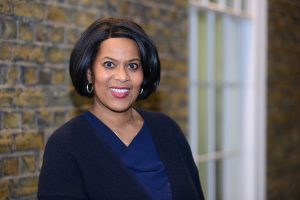 Image of Yvonne Coghill smiling at the camera.