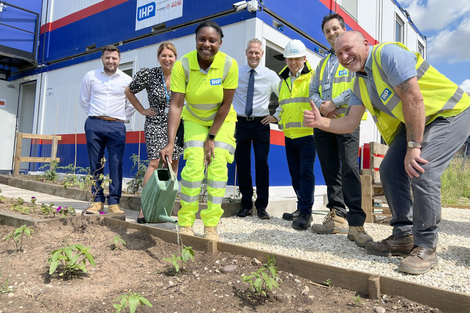Picture of NHS staff planting trees in the wellbeing garden at Bassetlaw Hospital Emergency Village.