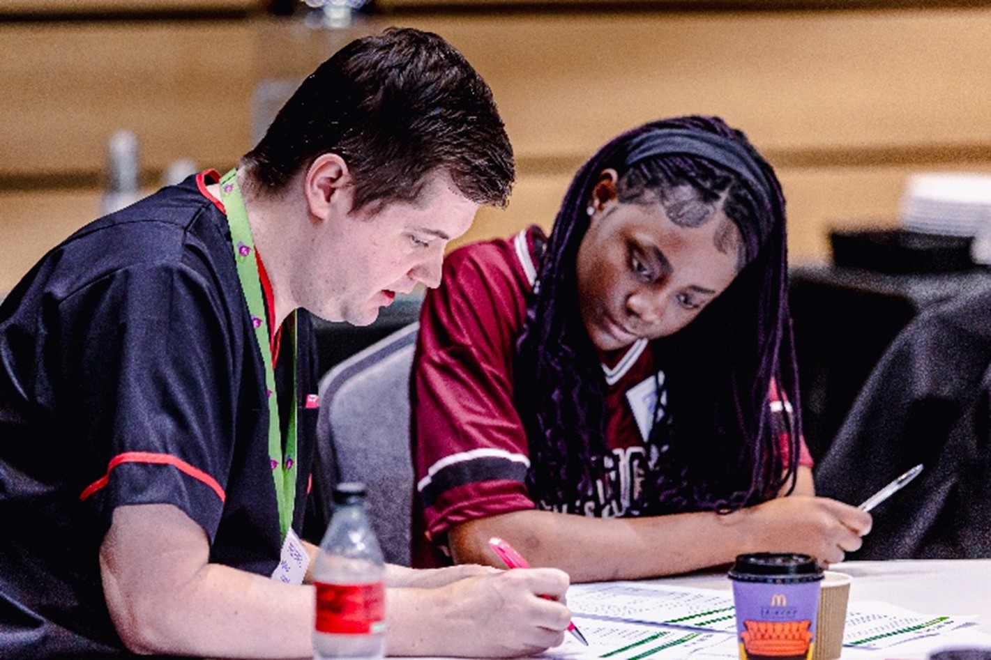 Michael Nertney, Nurse & Resuscitation Officer South Tees NHS Foundation Trust, helping a student look at assessment of a patient’s blood test readings.