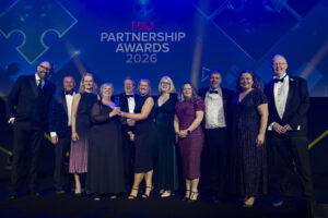 The Sewell Advisory & NHS South Yorkshire ICB teams celebrating a HSJ Award win