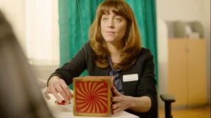 Female clinician opening jack in a box