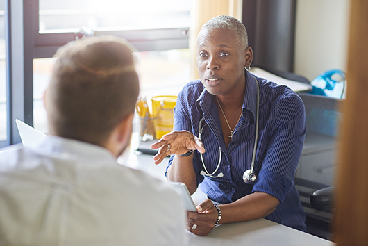 Doctor talking to patient