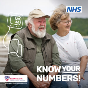 A older man and woman with a drawing of a blood pressure monitor 