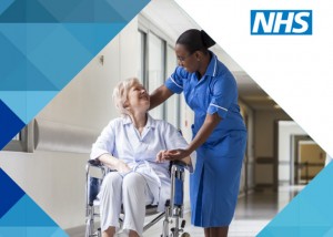 Lady in a wheelchair with nurse
