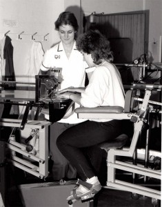 Image of a nurse, with a patient doing some exercise