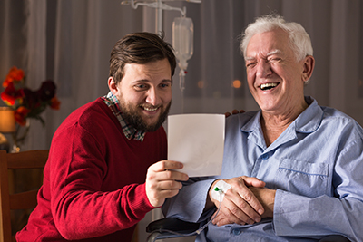 A father and his son reading a letter