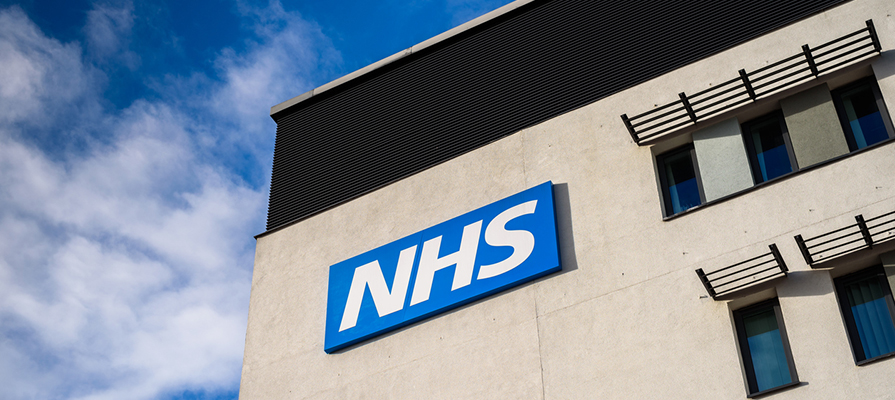 NHS sign on building