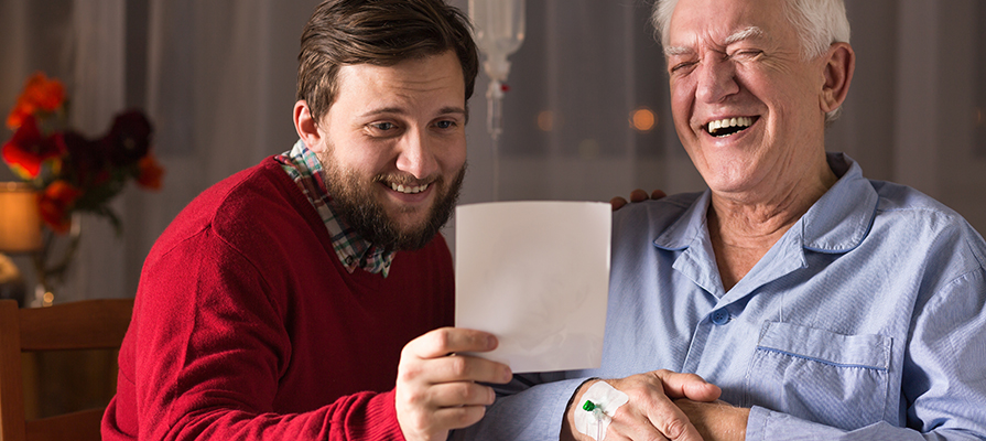 A father and his son reading a letter