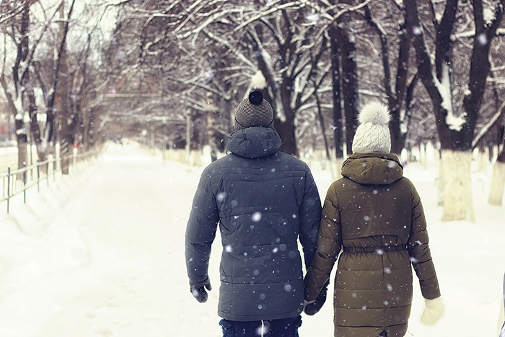 A couple walking in the snow