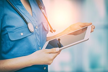 Nurse using an ipad