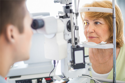 Patient having her eyes examined