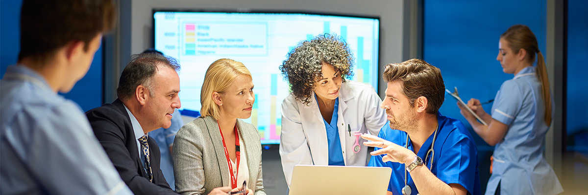 NHS staff hold a meeting