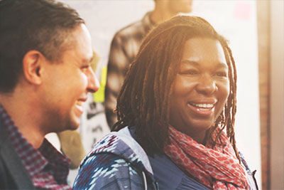 Two people laughing