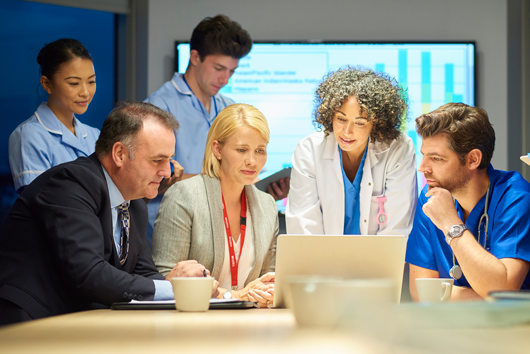 NHS staff in a meeting
