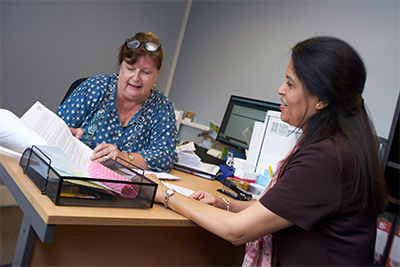 Photograph of a patient and a healthcare professional