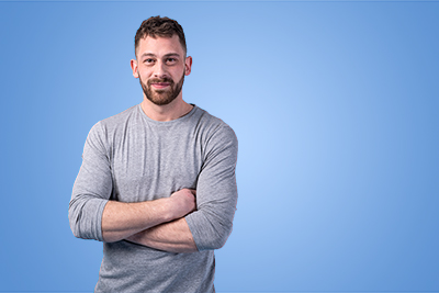 Middle aged man with arms crossed