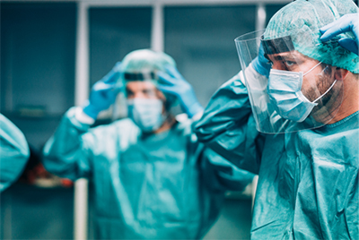 Doctors putting on masks