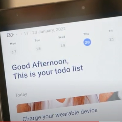 Tablet screen displaying a web page which reads: Good afternoon, This is your todo list. Charge your wearable device.