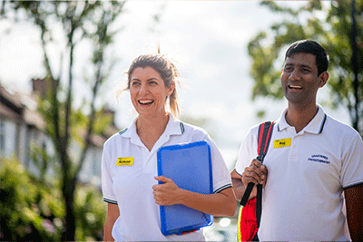 Two community healthcare professionals