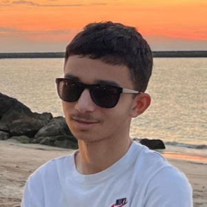 A profile photo of young board member Daniel.